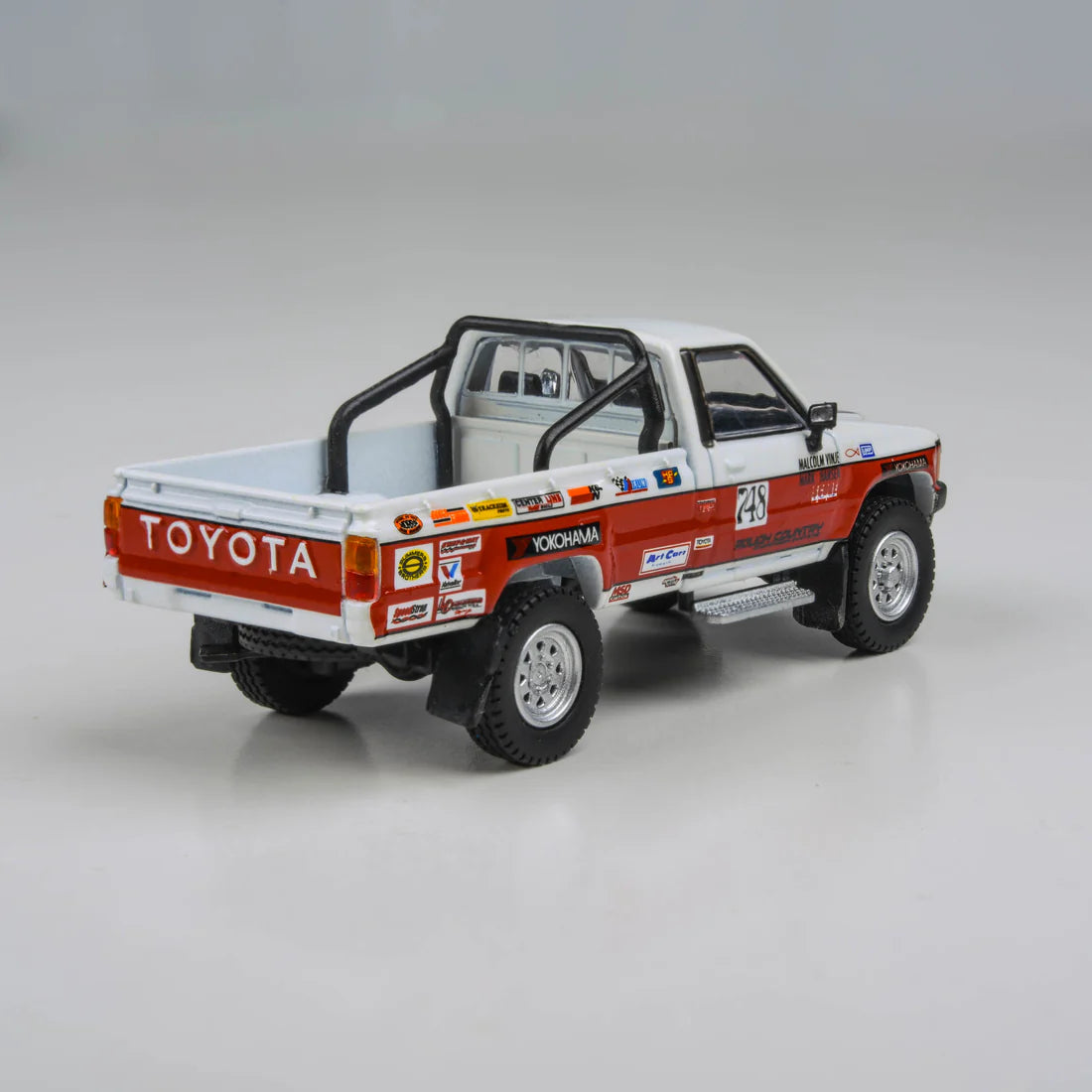 Toyota Hilux 1987 Mojave 250 Scale 1:64 Die-Cast Model Car Toy – Classic Pickup Truck Collectible for Kids & Collectors