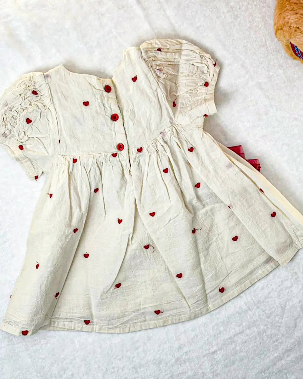 Elegant Cream Baby Frock with Red Heart Embroidery & Statement Bow