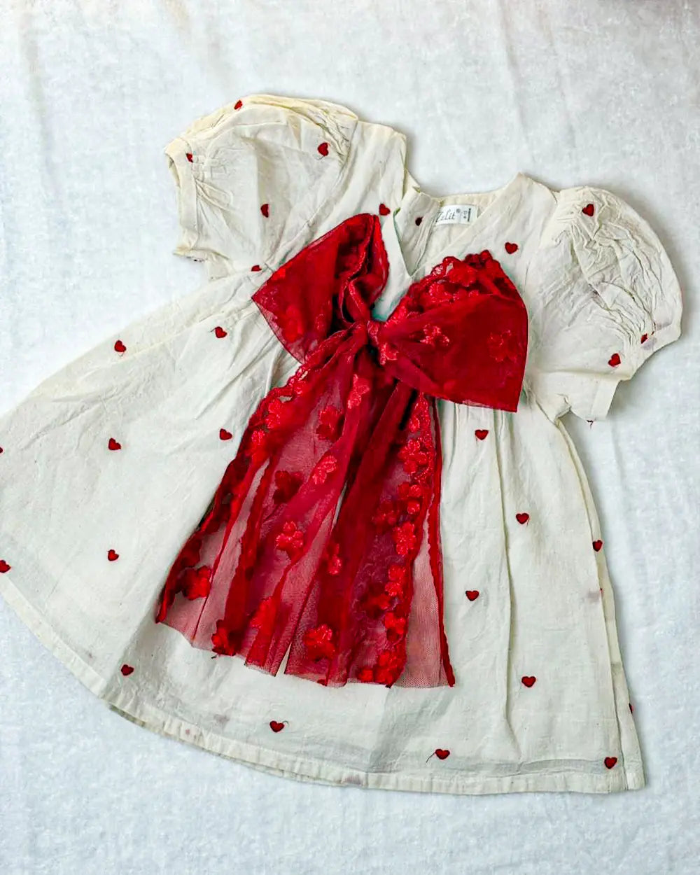 Elegant Cream Baby Frock with Red Heart Embroidery & Statement Bow